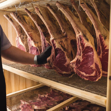 Why do some dry-aged steaks age longer than others?